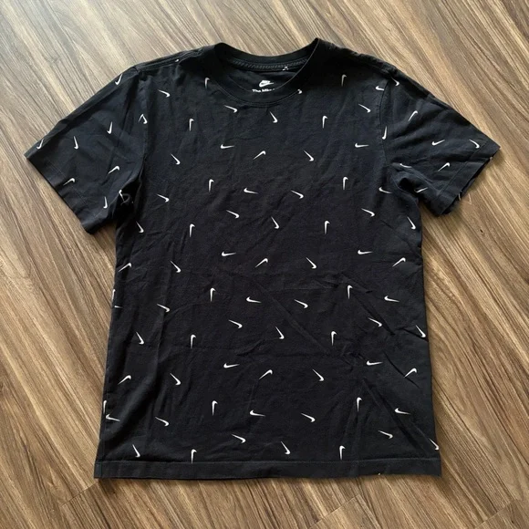Nike RARE All-Over SWOOSH Print Black Tee - Picture 1 of 9